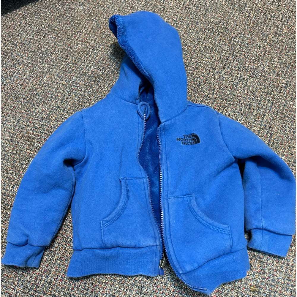 North face blue kids zip up sweatshirt